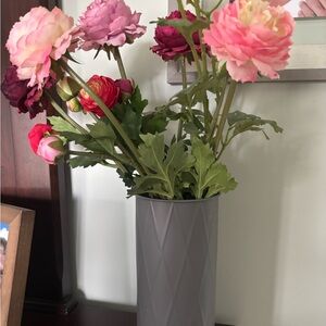 Heavy flower vase and faux flowers.